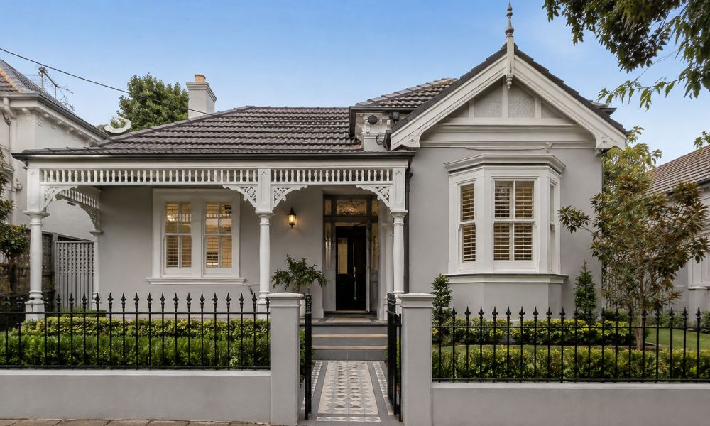 Freshly repainted roughcast render Federation home facade in Burwood