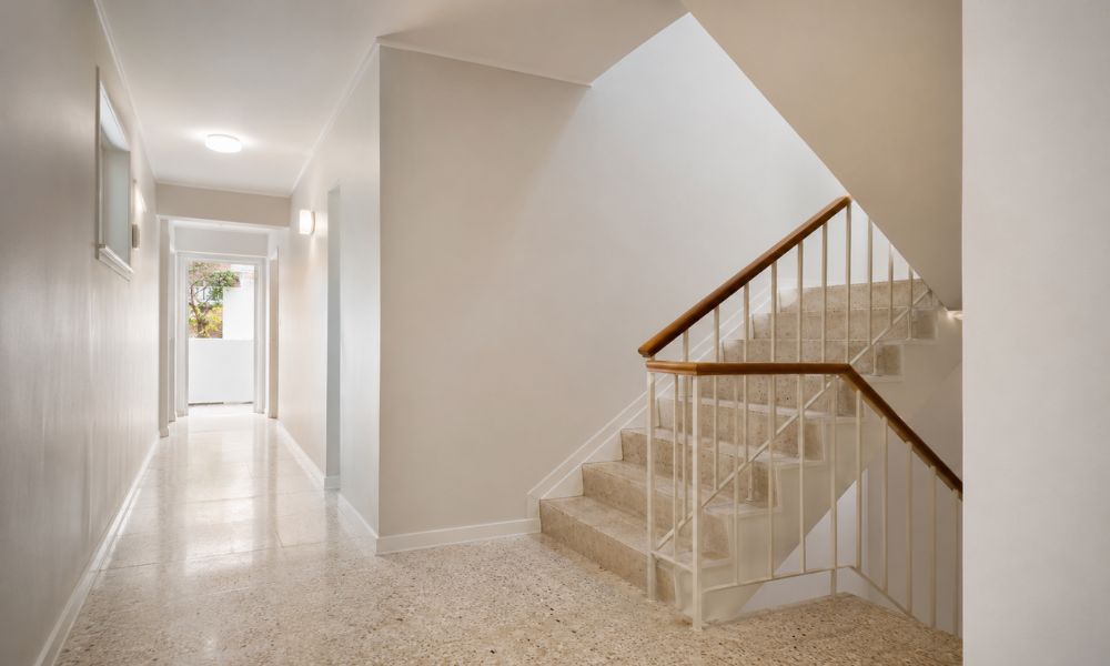 Repainted stairwell and common area inside a Coogee strata apartment building