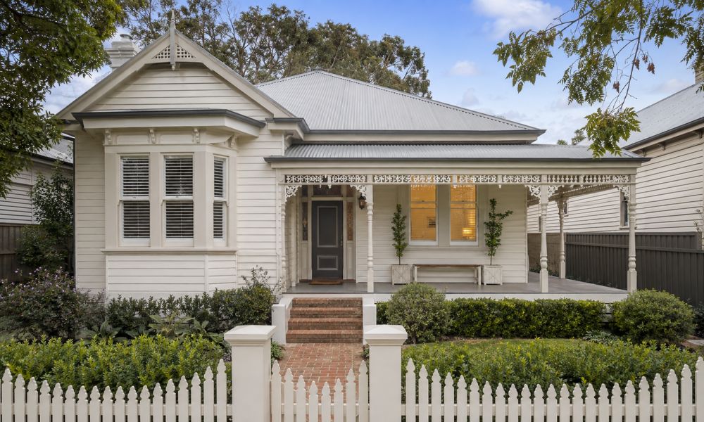 Freshly repainted Federation weatherboard facade with restored timber trim on a Lower North Shore home