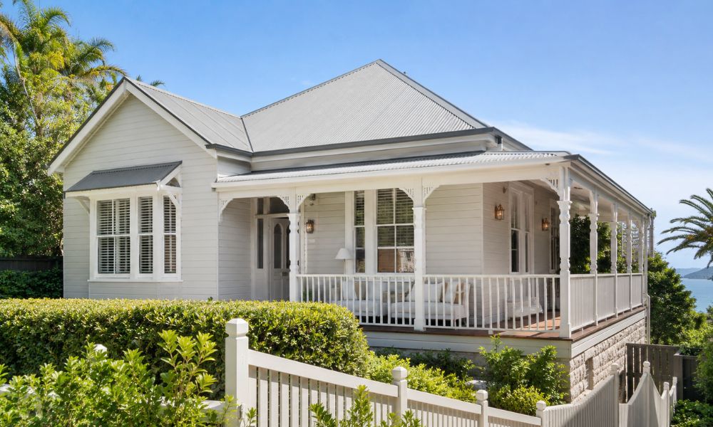 Restored heritage weatherboard facade repainted on a Palm Beach holiday home