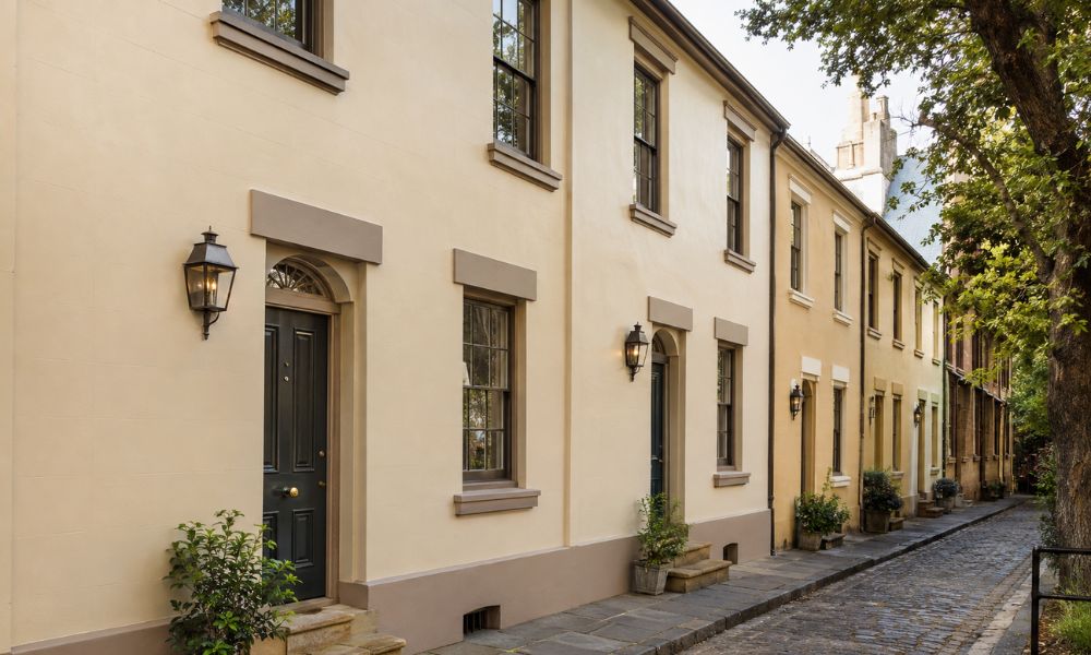 Colonial terrace facade in The Rocks part-stripped and repainted in a heritage colour scheme