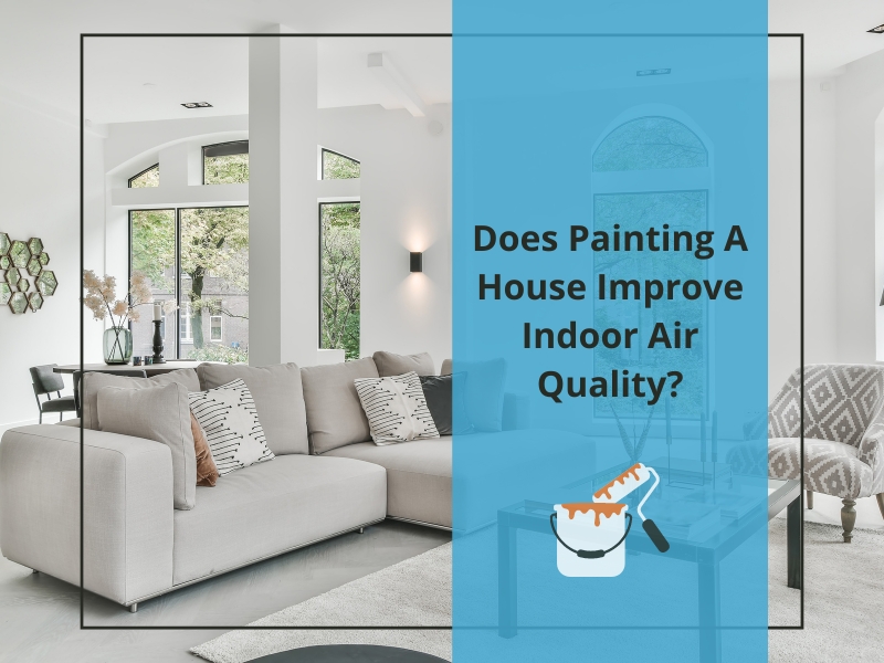 Modern living room with large windows, neutral furniture, and a blue overlay text asking if painting a house improves air quality.