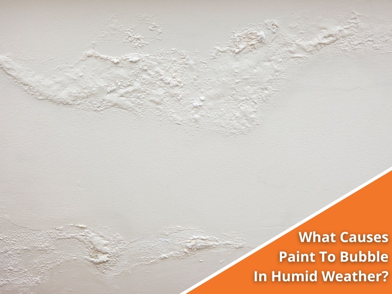 A close-up of bubbling paint on a wall due to high humidity, showing blistering and poor paint adhesion problems.