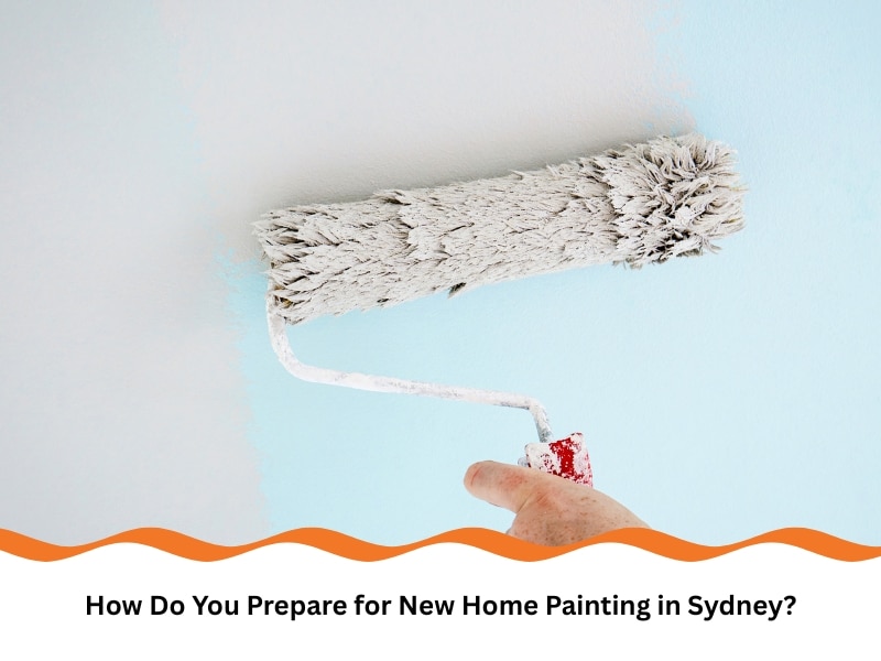 New home painting in progress with roller applying white coat over a blue wall in a Sydney home.