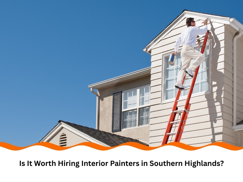 Professional painters Southern Highlands painting a house exterior on ladder.