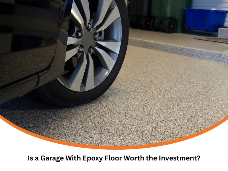 Close-up of car wheel parked on smooth garage with epoxy floor finish.